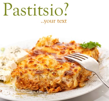 Pastitsio & feta cheese in a plate, greek traditional food, on white background