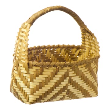 basket  in a natural fibers woven  on a white background