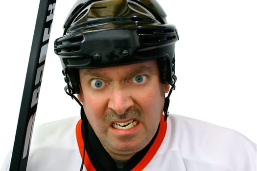Hockey player is angrily sitting on the bench after receiving a penalty. The design on the hockey stick was re-arranged to hide its origin.