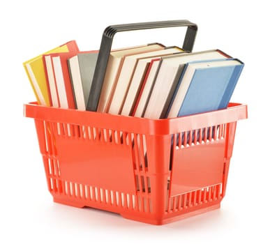Plastic shopping basket with books isolated on white