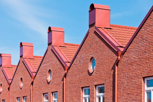 Brick Wall building towards blue sky