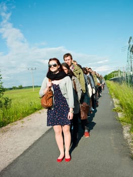 Group of people waiting in line
