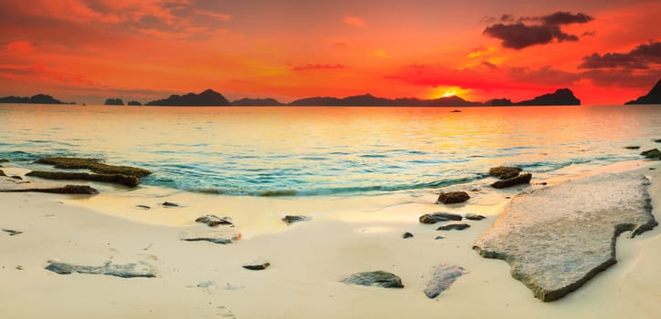 Beautiful seascape panorama. Stone on the foreground. Philippines