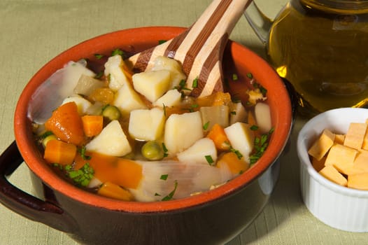 rustic soup with mixed vegetables and pumpkin