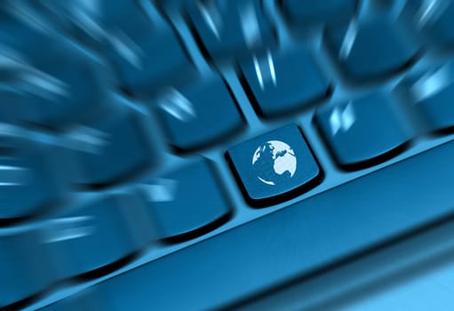 Internet Concept - Detail of Key With Globe Symbol on Keyboard