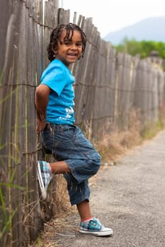 Outdoor portrait of a cute african american little boy