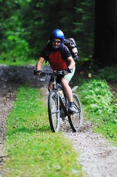 healthy lifestyle and fitness concept with mount bike man outdoor