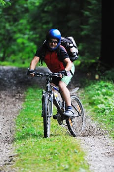 healthy lifestyle and fitness concept with mount bike man outdoor