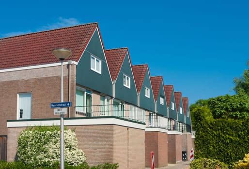 row of identical detached houses in Oldenzaal