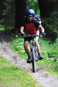healthy lifestyle and fitness concept with mount bike man outdoor