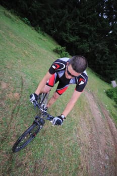 healthy lifestyle and fitness concept with mount bike man outdoor