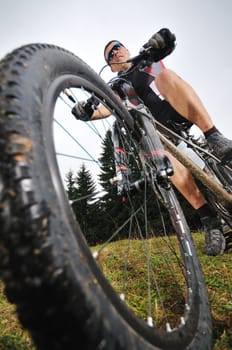 healthy lifestyle and fitness concept with mount bike man outdoor