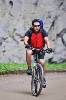healthy lifestyle and fitness concept with mount bike man outdoor