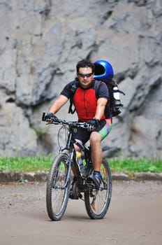 healthy lifestyle and fitness concept with mount bike man outdoor