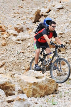 healthy lifestyle and fitness concept with mount bike man outdoor