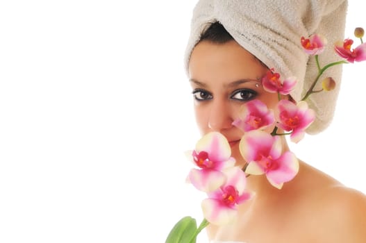 beauty halth and spa wellness isolated young woman face portrait closeup with towel and flower treatment