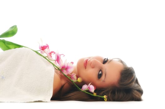 beauty halth and spa wellness isolated young woman face portrait closeup with towel and flower treatment