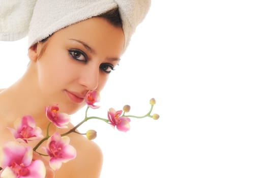 beauty halth and spa wellness isolated young woman face portrait closeup with towel and flower treatment