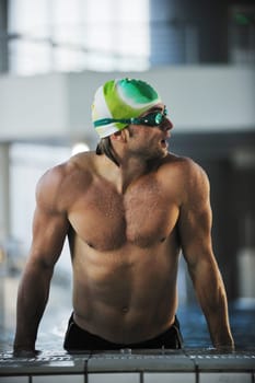 health and fitness lifestyle concept with young athlete swimmer recreating  on olimpic pool