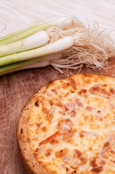 Quiche Lorraine with bacon on a board