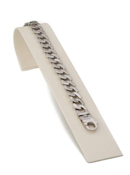 Silver linked chain bracelet on display stand
