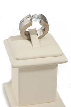 Studio shot of diamond ring on display stand