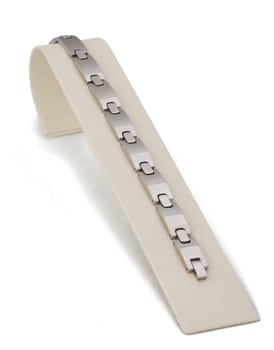 Silver linked chain bracelet on display stand