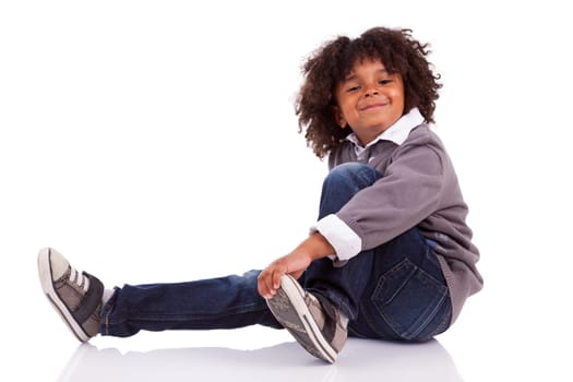 Portrait of a cute african american little boy, isolated on white background
