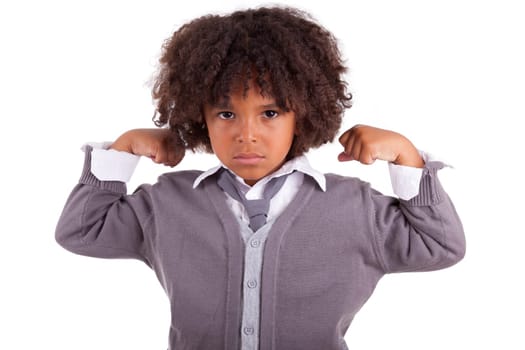 Portrait of a little african boy showing his muscles ,isolated on white background
