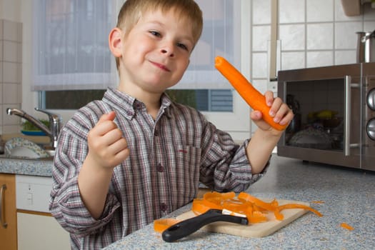 Child peeling carrots