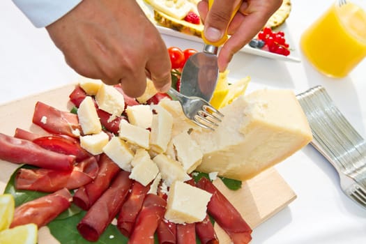Italian appetizer with bresaola and parmesan cheese