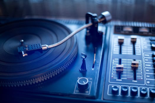 Outfashioned vinyl player is waiting its wise user