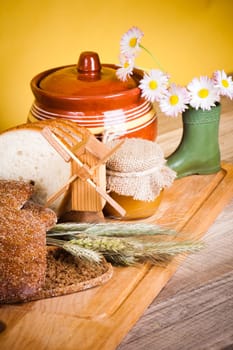 sliced bread and wheat on the wooden table