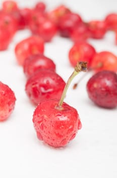 Fresh Red Cherries on White Wooden Table
