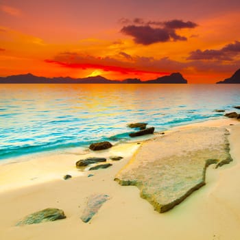 Beautiful seascape. Stone on the foreground. Philippines
