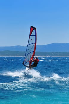man wind sirfing and have healthy lifestyle