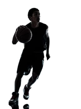 one young man basketball player silhouette in studio isolated on white background