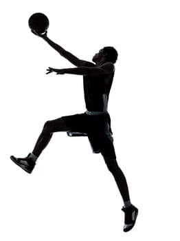 one young man basketball player silhouette in studio isolated on white background