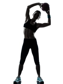 one caucasian woman exercising fitness ball workout posture in silhouette studio isolated on white background