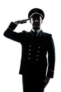 one caucasian man in airline pilot uniform saluting silhouette  in studio isolated on white background