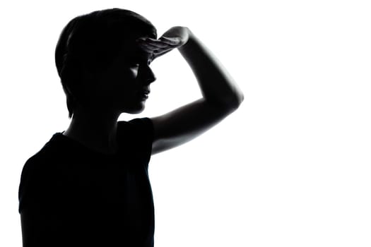 one caucasian young teenager silhouette boy or girl  looking foward  portrait in studio cut out isolated on white background