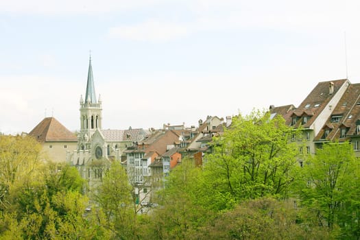 Berne, Switzerland. Beautiful old town. Prominent cathedral tower.