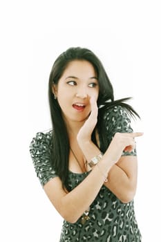 beautiful woman laughing and pointing at someone