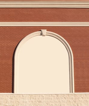 Ornate Roman styled brick wall with curved molding and copy space.