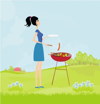 woman cooking on her barbecue on rural landscape