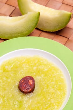 Cold soup with melon and Spanish chorizo sausage