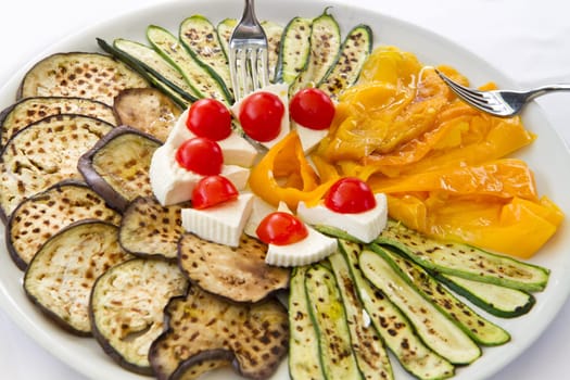 grilled vegetables with tomatoes and cheese