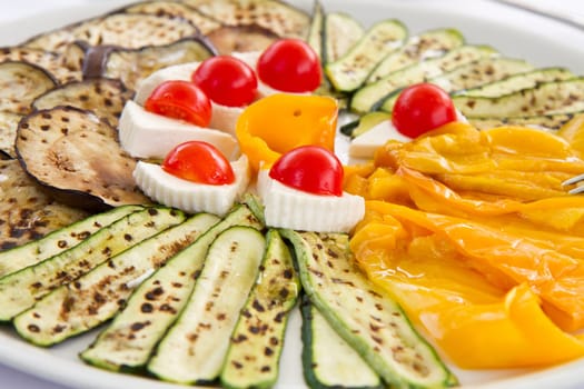 grilled vegetables with tomatoes and cheese