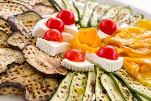 grilled vegetables with tomatoes and cheese