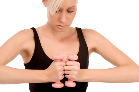 Young female undergoing fitness training on white background.
